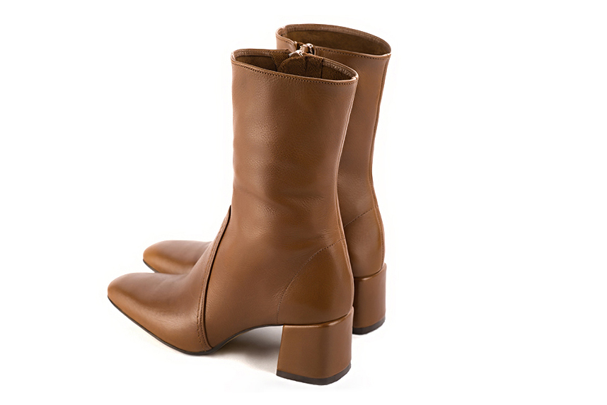 Caramel brown women's ankle boots with a zip on the inside. Square toe. Medium block heels. Rear view - Florence KOOIJMAN